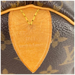 Louis Vuitton Speedy 25 Monogram Canvas Carrier bags Louis Vuitton 24 Louis Vuitton Speedy 25 Monogram Canvas Carrier bags Louis Vuitton 24