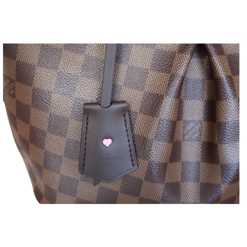 Louis Vuitton Clochette Brown