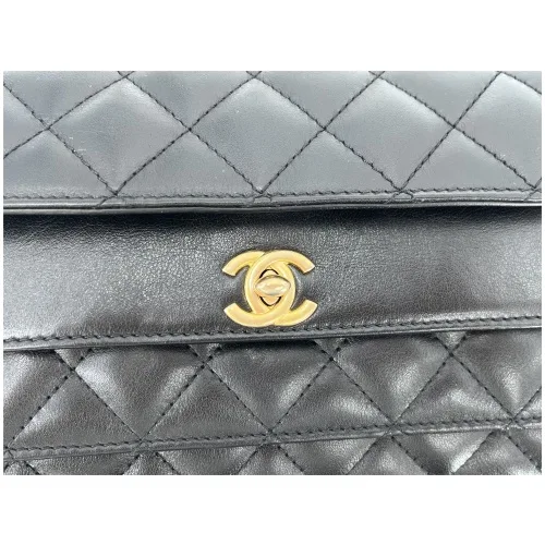 Chanel Triple Flap Bag Schwarz