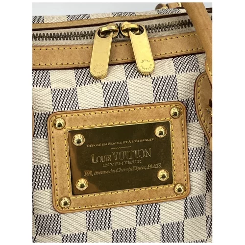 Louis vuitton purse with gold plate on sale