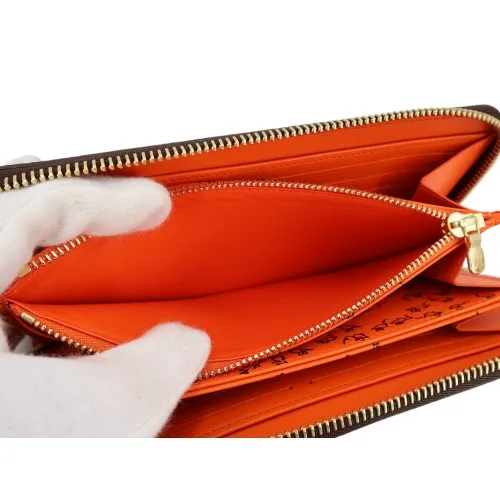 Louis Vuitton Catogram Zippy - I Love Handbags