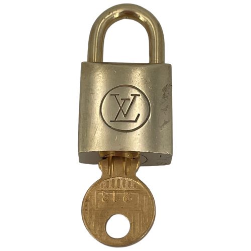 Louis Vuitton 324 LV Lock and Key - $80 - From Rheeana