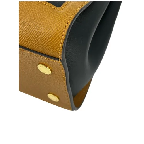 Louis Vuitton The Arch PM