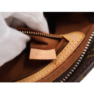 Louis Vuitton Trotteur Monogram Canvas
