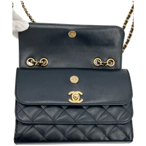 Chanel Triple Flap Bag Schwarz