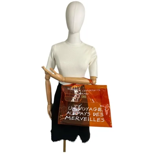 Hermès Vintage Vinyl Kelly Orange